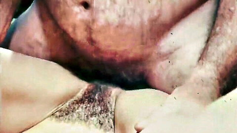 Close-up of hairy man and woman in intimate farm encounter