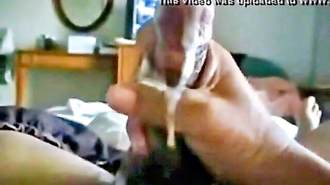Amateur handjob with intense cumshot, struggling to hold back orgasm