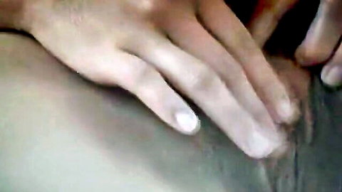 Close-up of Josie Rall's hand touching hairy intimate area