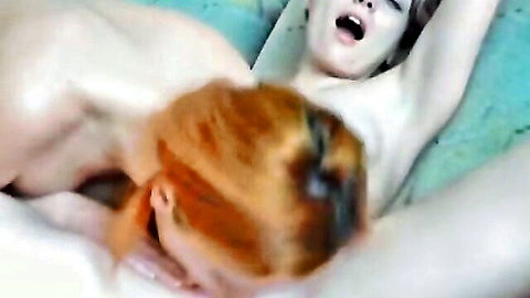 Nude redhead and blonde girls in intense lesbian pussy eating action