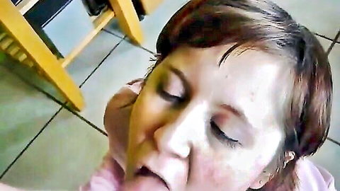 POV closeup of amateur short-haired wife sticking tongue out during homemade blowjob