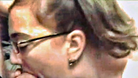 Asian woman with glasses smiling during party oral gangbang