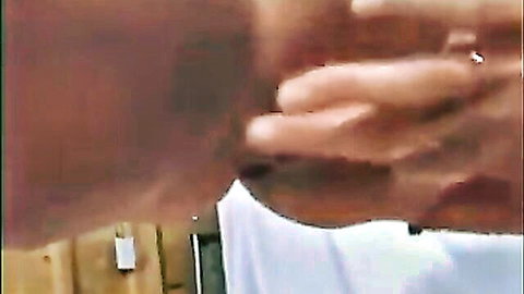 Woman opens mouth wide with tongue out to swallow thick creamy cum from hand