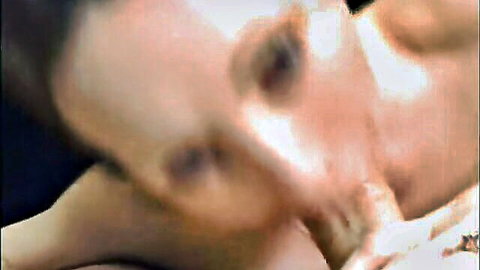 Blurry close-up of seductive woman in intimate neck pose, part 2