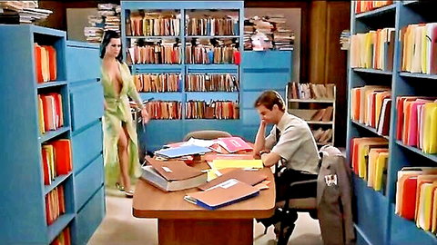 Joanie Laurer as Chyna in sexy green J-Lo dress, standing seductively