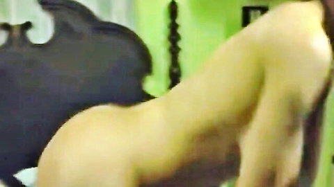 Nude woman bent over from behind exposing her bare ass cheeks and pussy lips