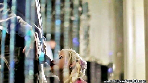 Fellucia Blow as mysterious blonde giving hidden blowjob on knees
