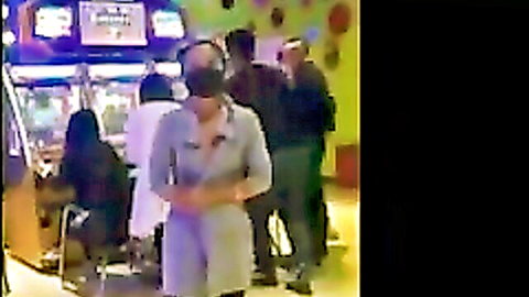 Group flashing in arcade public exhibition amateur scene