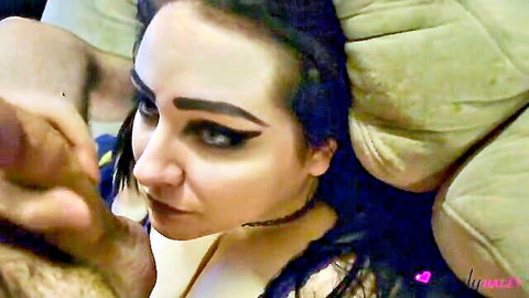Goth babe Lynn teases cock before explosive facial cumshot