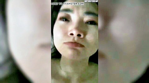 Close-up of beautiful sexy Singaporean Asian girlfriend's face, amateur selfie