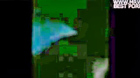 Blurry green-tinted porn video frame with www.mbw and BEST PORN watermarks