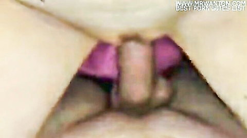 Close-up of wet shaved pussy with pink labia and insertion in solo orgasm video