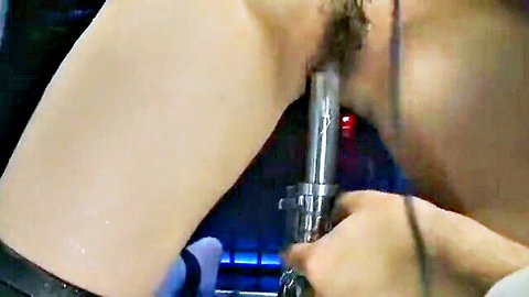 Japanese woman in intense electric BDSM insertion scene