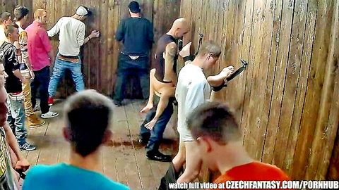 Czech Fantasy gangbang with group of men surrounding nude woman outdoors