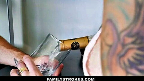 Portia Harlow as sexy step-aunt in lingerie pours drink with tattooed nephew, seductive family scene
