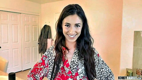 Cameron Canela in open kimono robe, smiling seductively