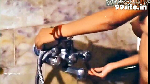 Nude Bengali bhabhi in steamy shower, exposing perky tits