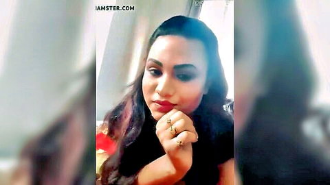 Seductive Indian woman with dark hair in teasing pose, dom cuck HD porn