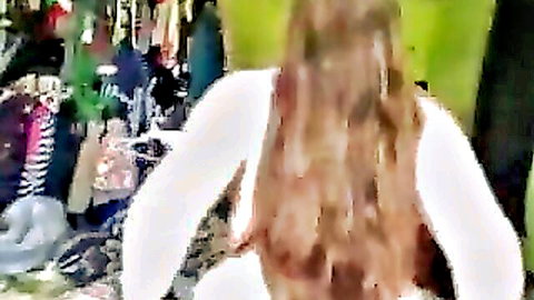 Long-haired brunette big ass in white top, rear view tease