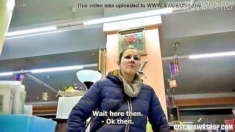 Clothed Czech babe in blue parka stands waiting in shop for raw public fuck