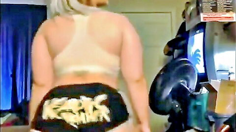 Blonde curvy woman twerking in tight shorts, large ass on display