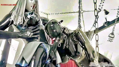 Latex-clad lesbians in chains: dominant babe teases submissive in BDSM play
