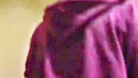 Mysterious babe in purple hood looking distressed, adult video thumbnail