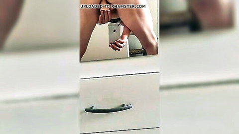 Amateur woman using new dildo on herself in mirror selfie, groaning