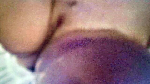 Greek wife with large breasts topless, masturbating solo