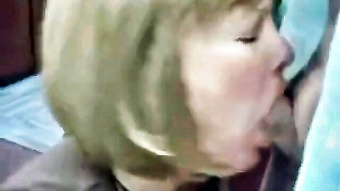 Mature blonde secretary passionately sucking nipple