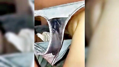 Woman in soaked white panties showing wet crotch closeup