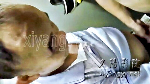 Mature Chinese man receives anal dildo insertion in intimate scene