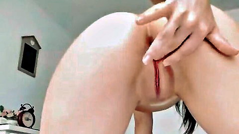 Babe bends over spreading ass cheeks exposing wet pink pussy and tight asshole solo