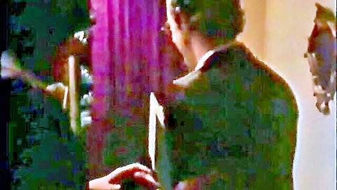 Brunette woman on knees giving blowjob to suited man