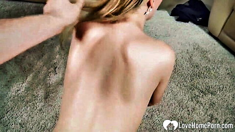 Blonde petite with small tits naked on knees pulled roughly by hair from behind in amateur homemade