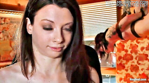 Tattooed guy gropes topless brunette's big tits from behind in kitchen