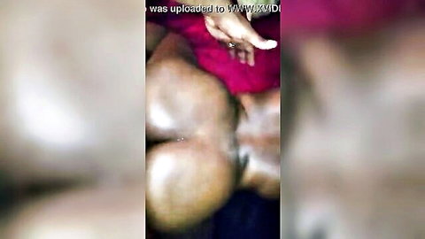 Ebony big ass close-up from behind with hand spreading cheek, backshots view