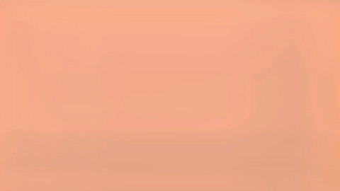 Solid peach orange background image with no visible content or action