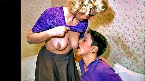 Blonde Mommy Natasa exposes big tits for sucking by young man