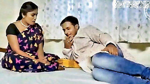 Marathi hot web series: Indian woman in colorful saree with man on bed