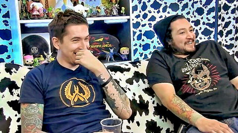Tattooed white guys laughing on couch during VR porn session