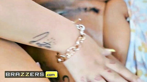 Tattooed brunette with bracelet spreads nude bubble butt cheeks exposing pink anus