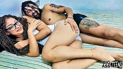 Big ass teen in white lingerie embraces tattooed stepbrother on bed