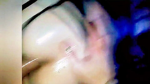 Oiled anal close-up with glistening white skin