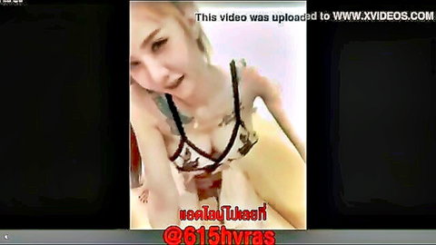 Nong Nam Khing in revealing lace lingerie, teasing cleavage in live broadcast