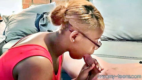 Black teen with glasses in red top gives sloppy blowjob