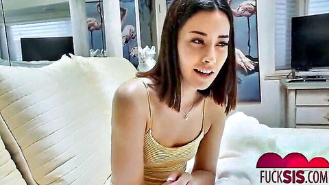 Petite brunette teen stepsister smiles seductively in tight yellow tank top on bed