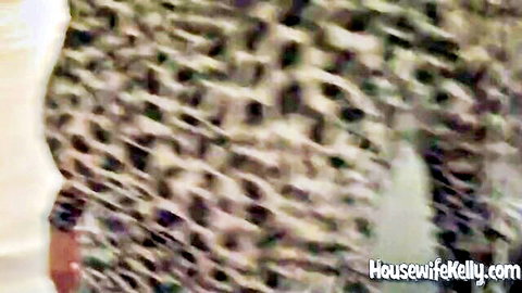 Housewife Kelly watermarked adult image with tiled text overlay obscuring explicit content