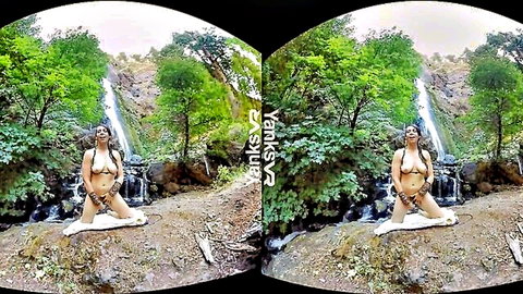 Tasty Luscious teases her clit topless by waterfall in nature VR