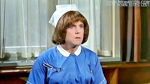 Barbara Windsor in sexy nurse uniform from Carry On parody